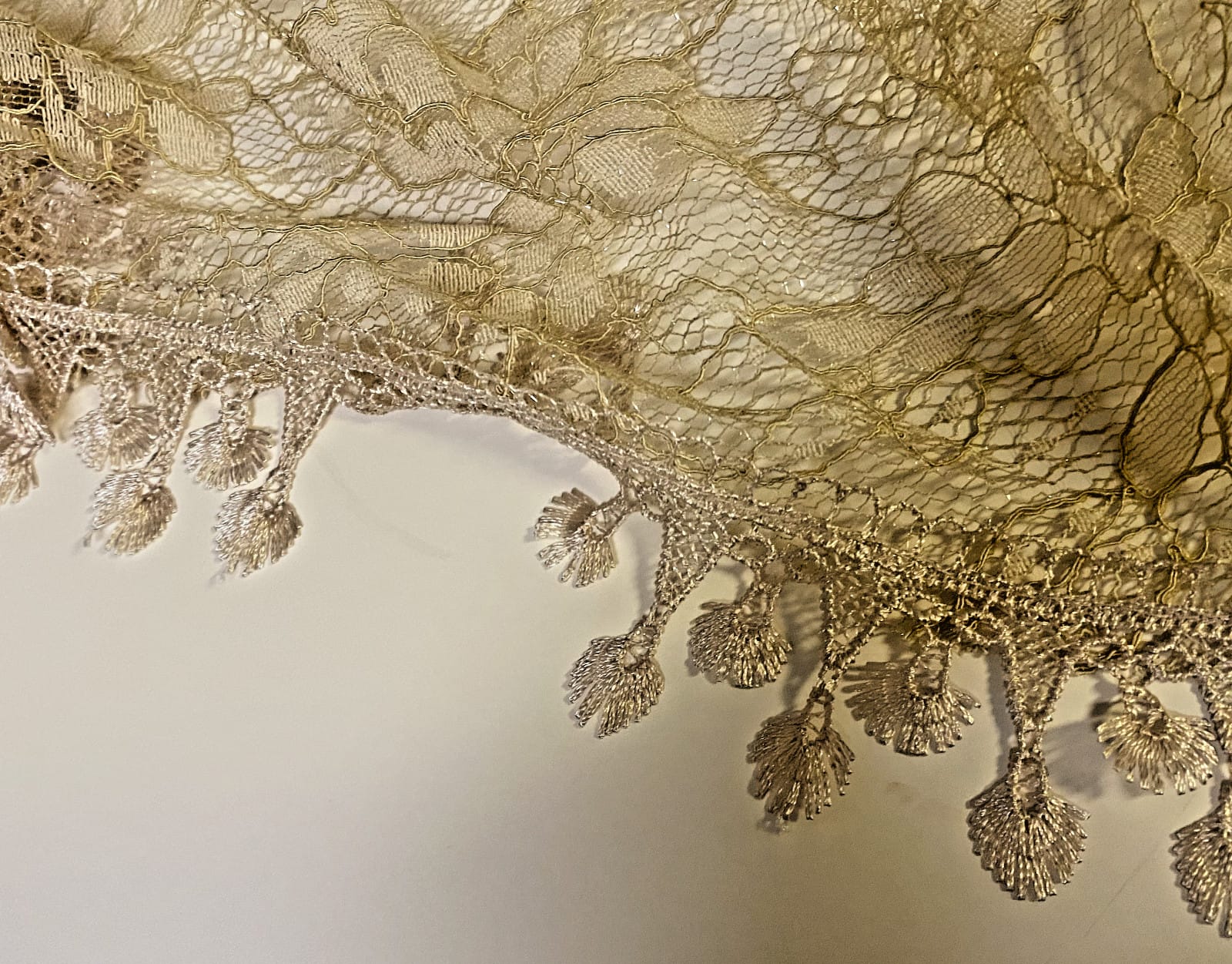 Light khaki lace church veil for women, elegant accessory with delicate lace detail, suitable for special occasions or religious events.