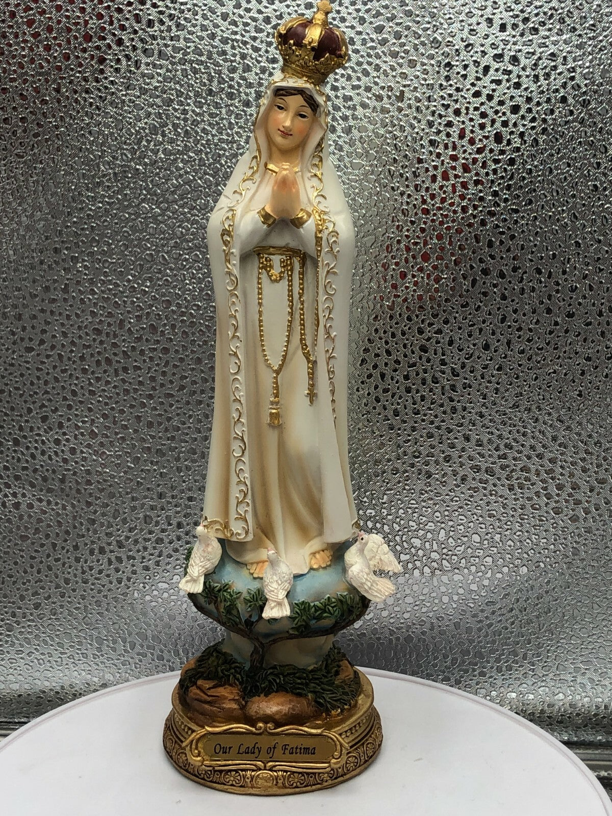 8-inch Our Lady of Fatima religious statue by Bob and Penny Lord, featuring a detailed depiction of the Christian figure.