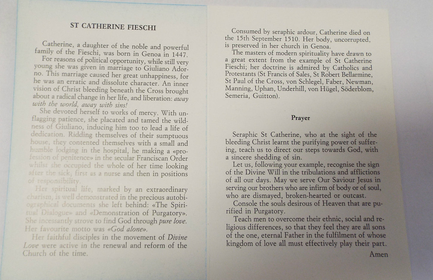 Saint Catherine of Genoa prayer poster with bio and teachings folder, featuring religious imagery and text, from Italy.