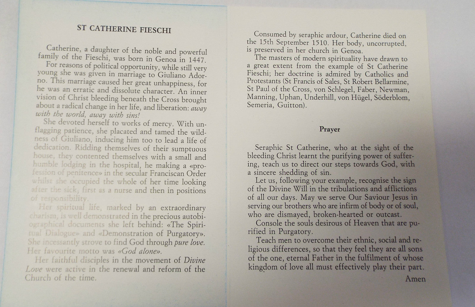 Saint Catherine of Genoa prayer poster with bio and teachings folder, featuring religious imagery and text, from Italy.