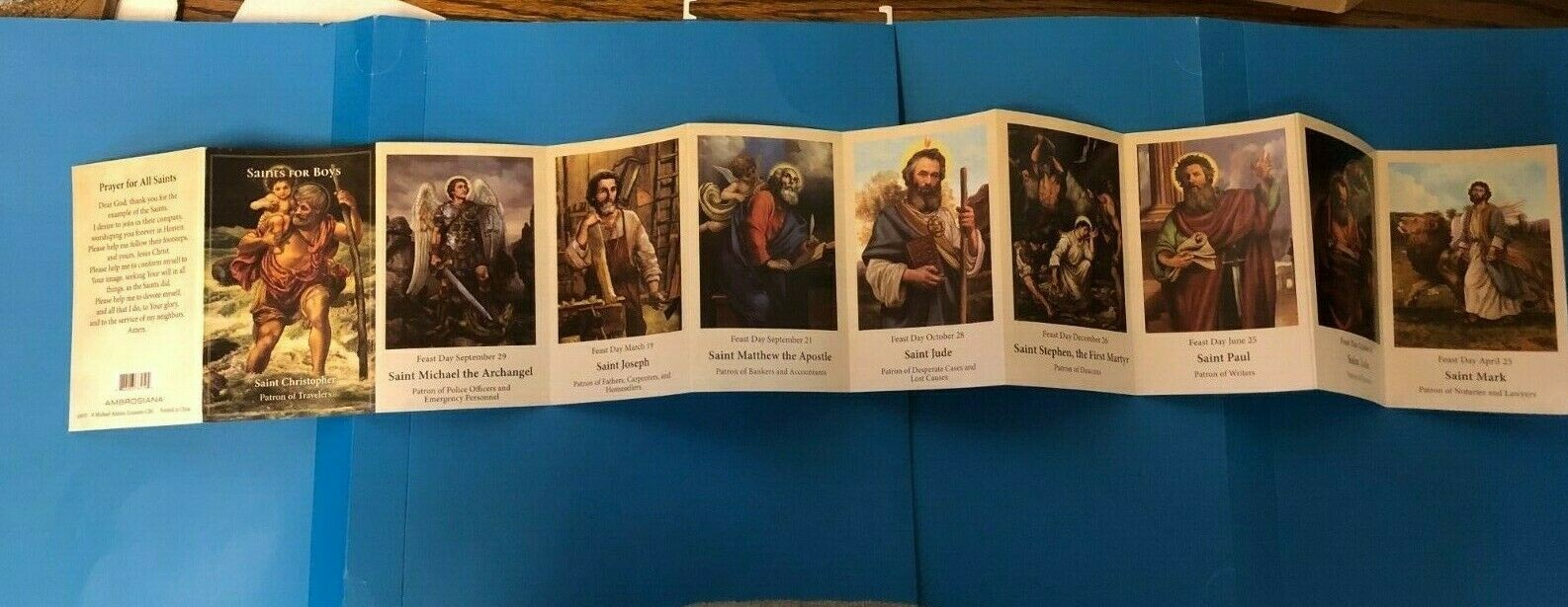 Saints for Boys prayer pocket folder by Bob and Penny Lord, featuring Christian holy card collectibles in a compact, portable design.