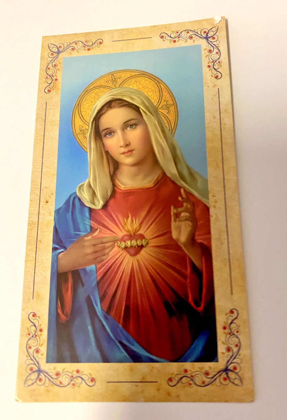 Small 4.25-inch Immaculate Heart of Mary statue with prayer card and bio, by Bob and Penny Lord.