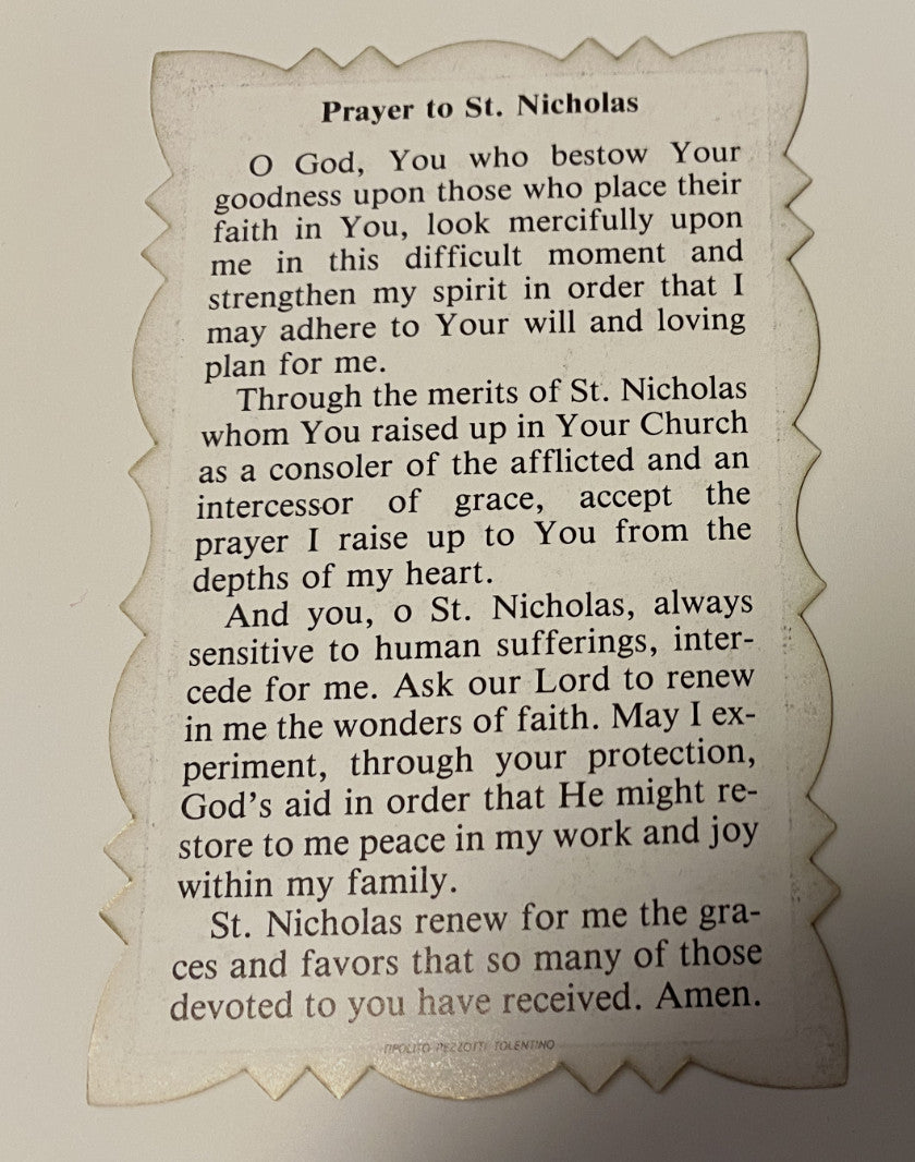 Saint Nicholas of Tolentino scalloped prayer card from Italy, religious Christian holy card with detailed artwork and spiritual imagery.