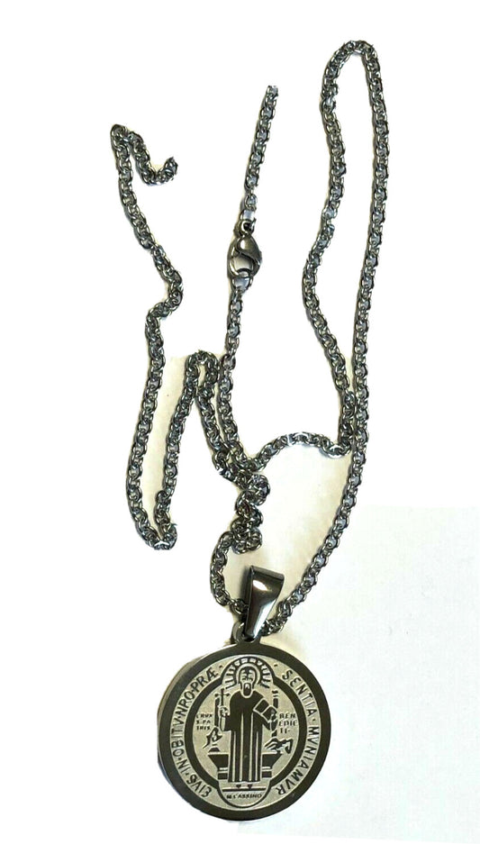 Silver Saint Benedict laser-engraved pendant featuring Christian crucifix and cross design by Bob and Penny Lord.