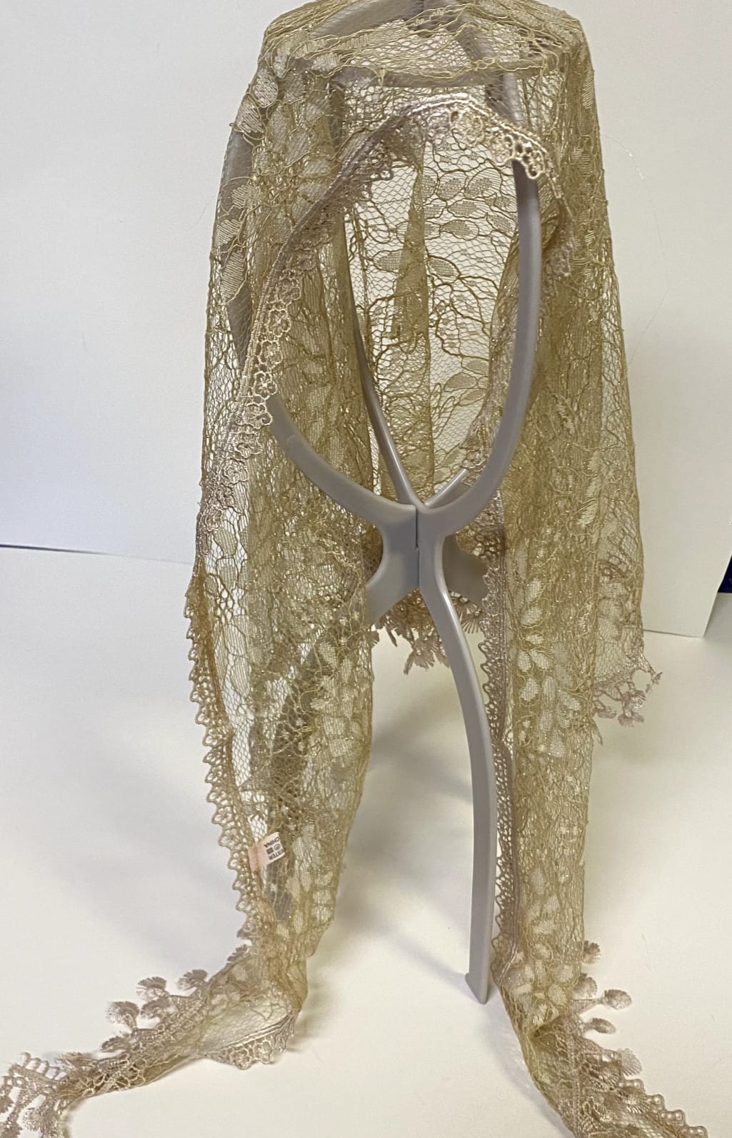 Women's light khaki lace church veil, soft and elegant, featuring delicate lace details for religious or special occasions.