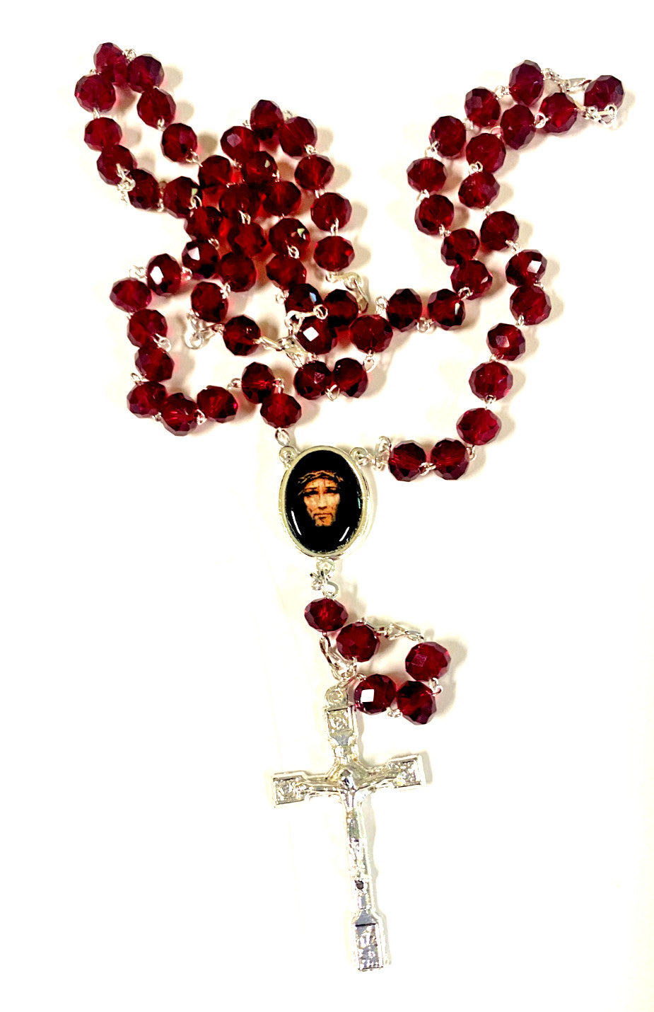 Handmade Crucified Jesus Christ rosary with beads, crafted in Colombia, featuring religious Christian symbolism and intricate details.