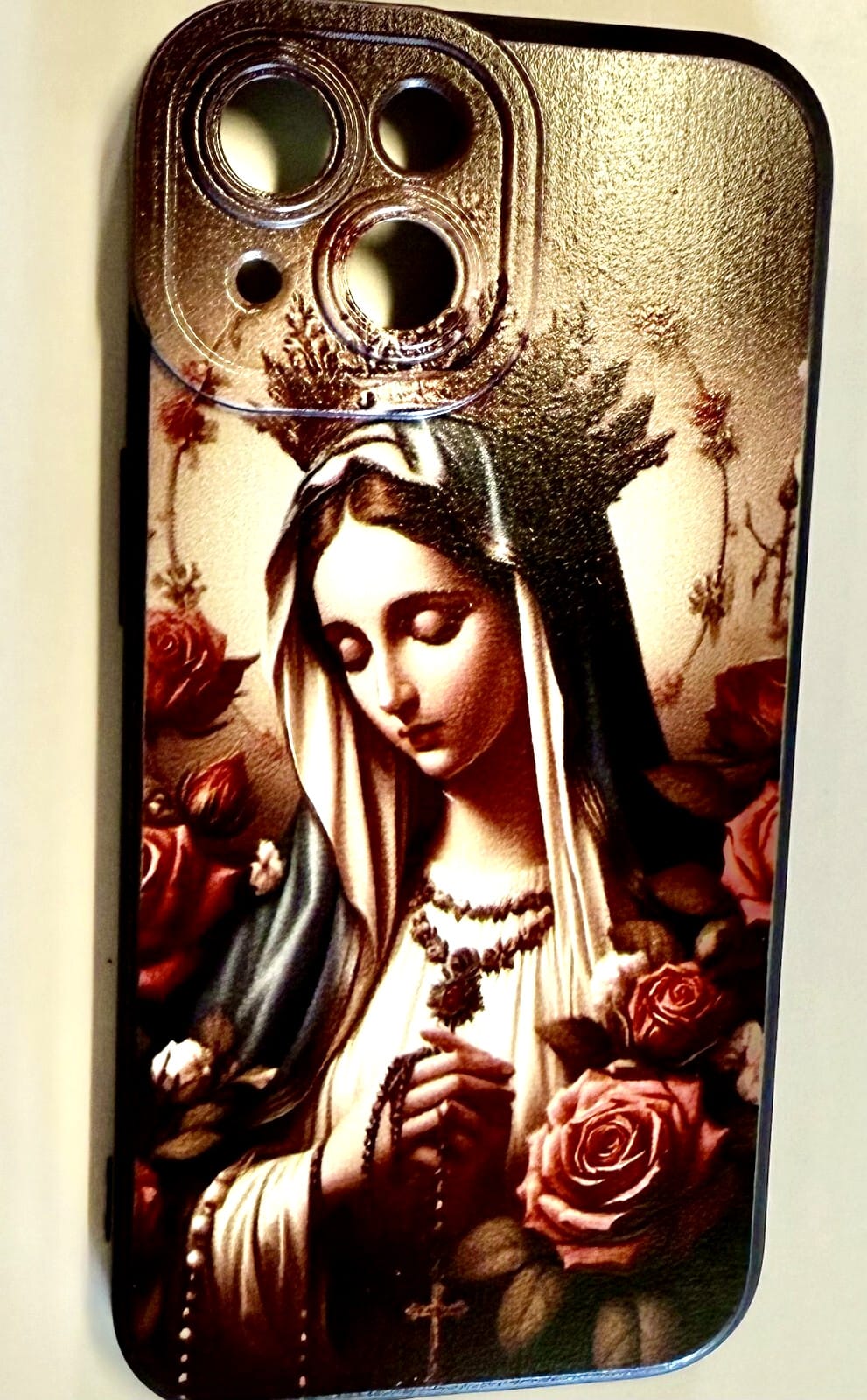Virgin Mary iPhone 15 case by New Case, featuring religious iconography, made of durable material, designed for protection and style.