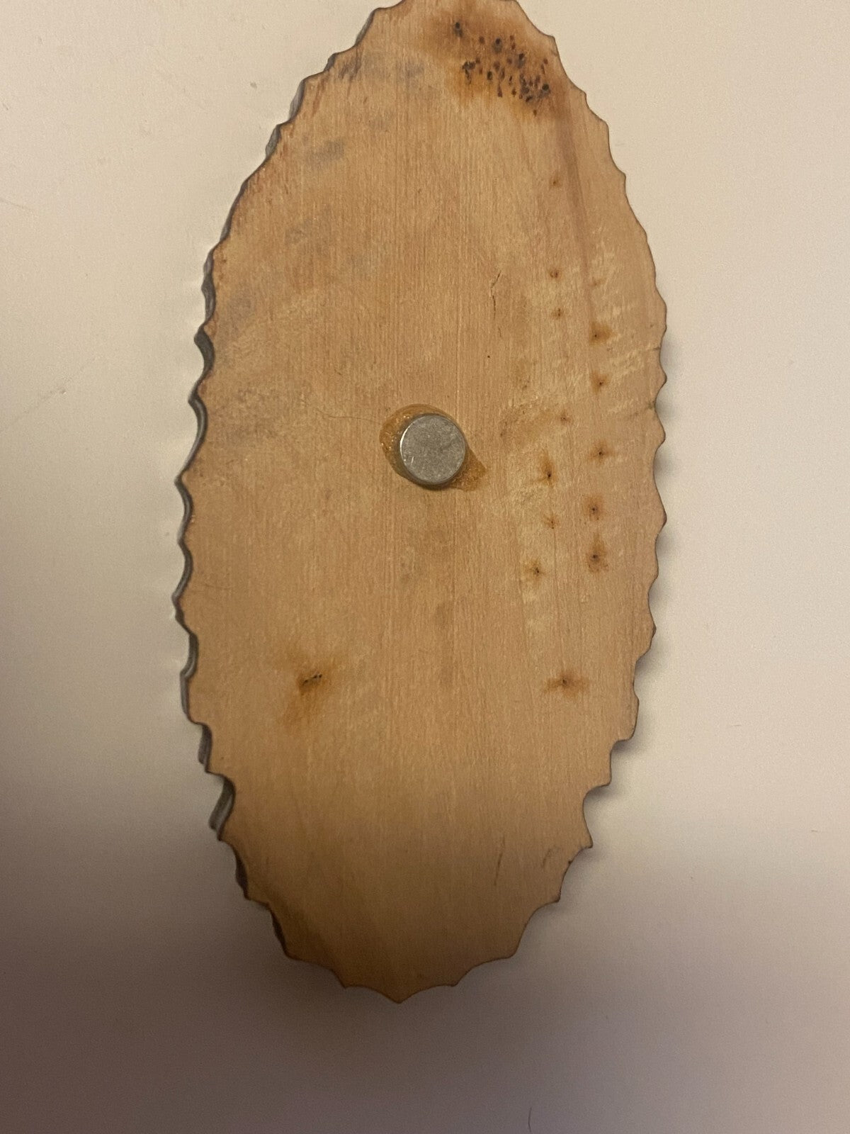 Olive wood Our Lady of Guadalupe magnet featuring religious Christian imagery, crafted by Bob and Penny Lord.