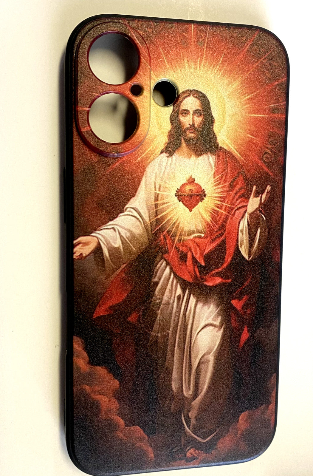 Sacred Heart of Jesus iPhone 14-16 cell phone case by New Case featuring religious artwork and protective design.
