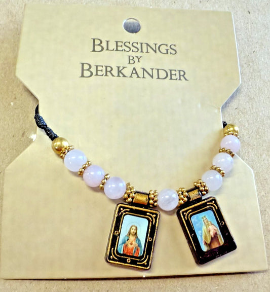 Black Cord scapular necklace featuring Sacred Heart and Mount Carmel pendants, stylish religious jewelry with detailed charms.