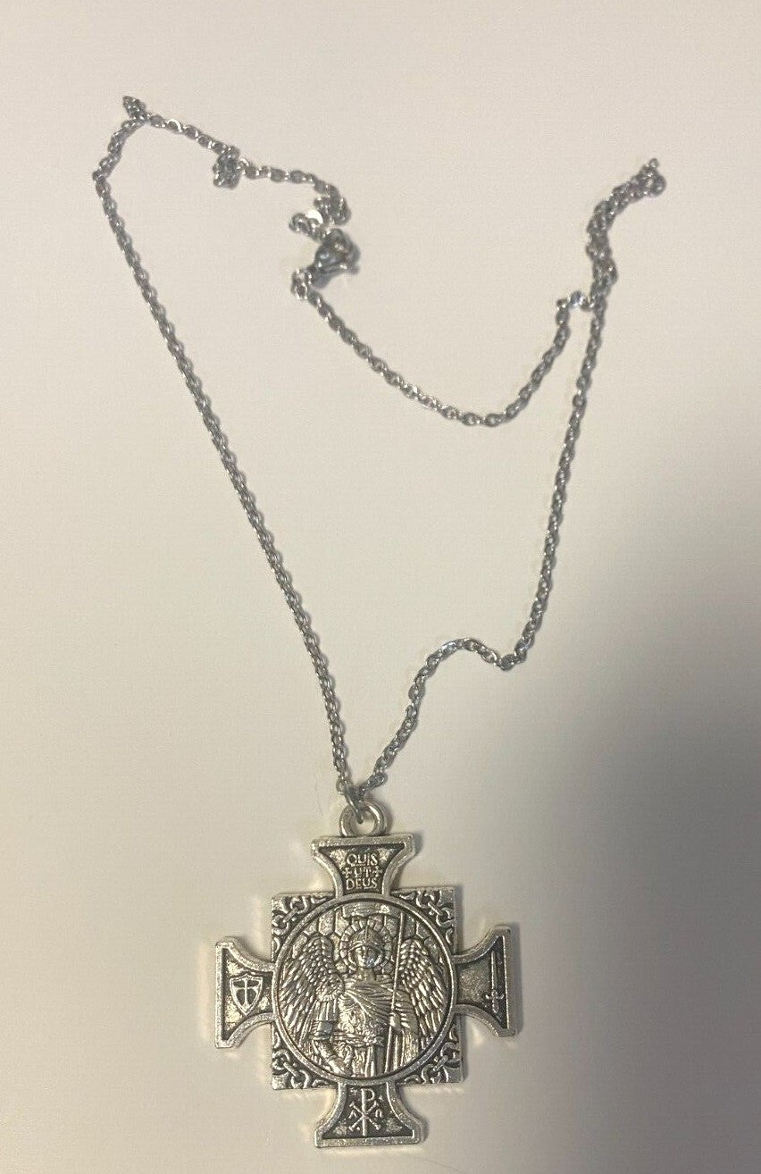 Gold and silver tone Saint Michael the Archangel iron cross pendant by Bob and Penny Lord, featuring detailed religious art design.