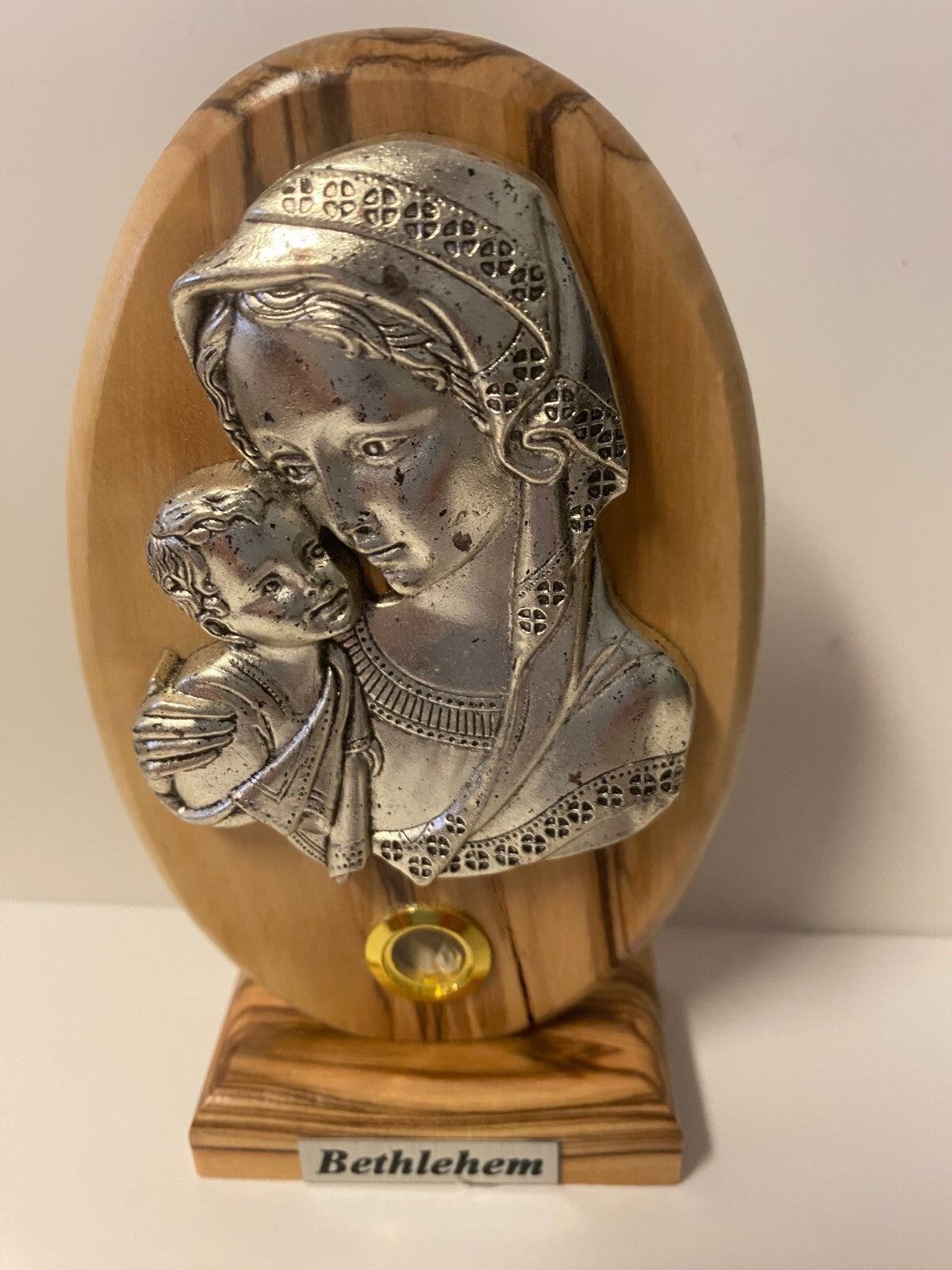 Pewter image of mother with child on wood plaque, 5-inch collectible from Bethlehem, religious Christian spirituality decor.