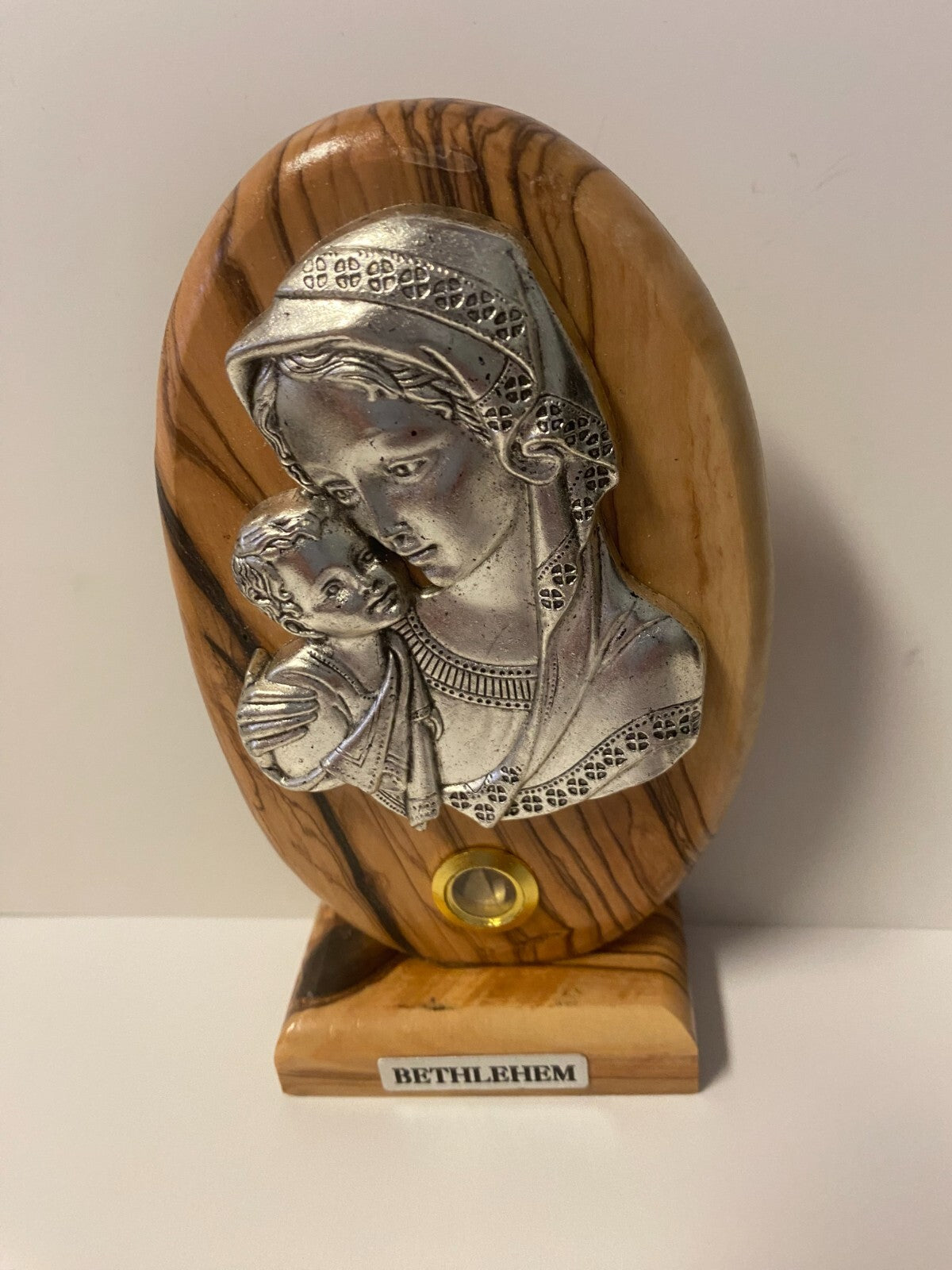 Pewter image of a mother with child on wooden plaque, 5-inch religious collectible by Bob and Penny Lord from Bethlehem collection.