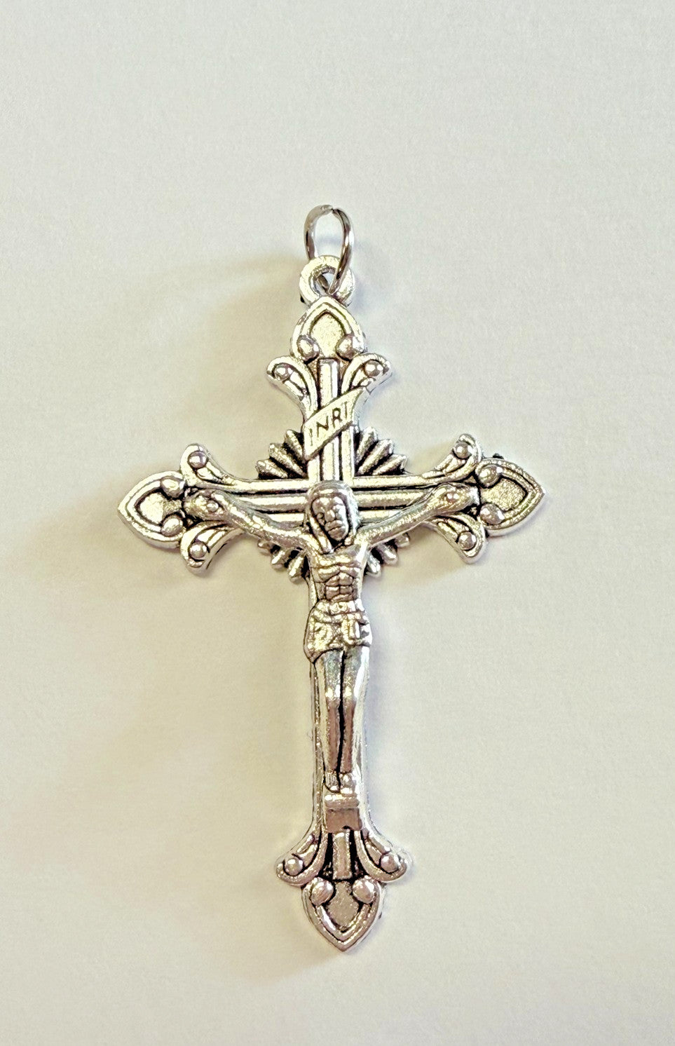 Silver plated 2-inch crucifix pendant by Bob and Penny Lord, detailed religious cross with intricate design, ideal for spirituality collection.