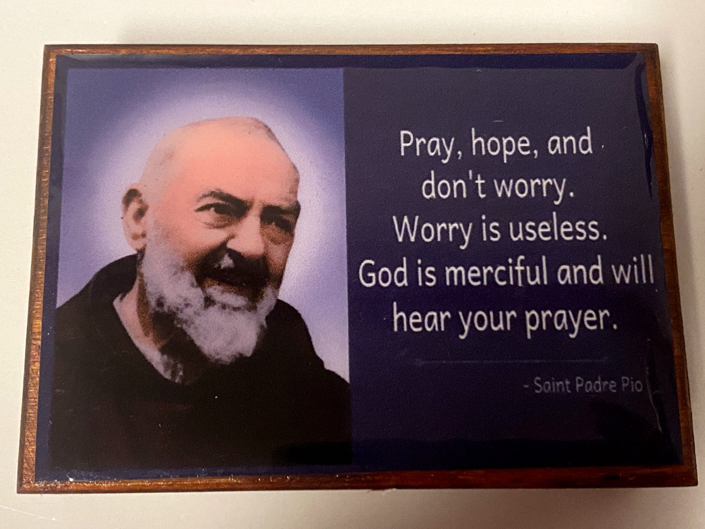 Wood Padre Pio rosary box with rosary beads, religious collectible from Colombia, featuring Christian spirituality and craftsmanship.
