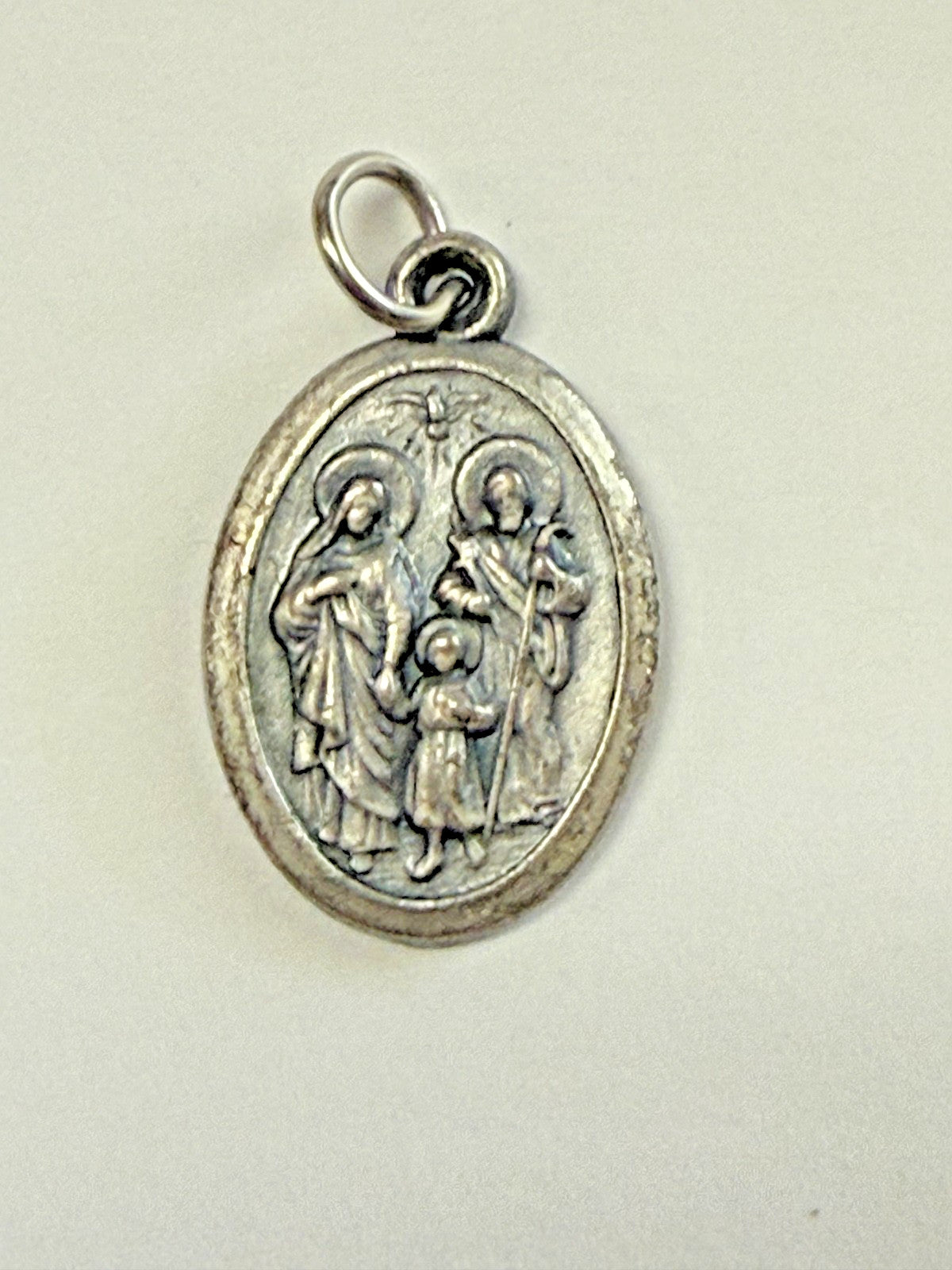 Holy Family and Holy Spirit medal by Bob and Penny Lord, Christian religious collectible with detailed religious imagery.