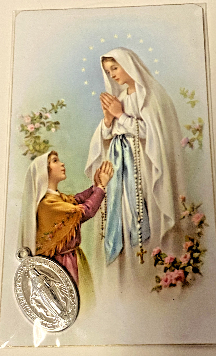 Blessed Mother image card and 1-inch medal from Japan, featuring religious Christian iconography, from Bob and Penny Lord collection.