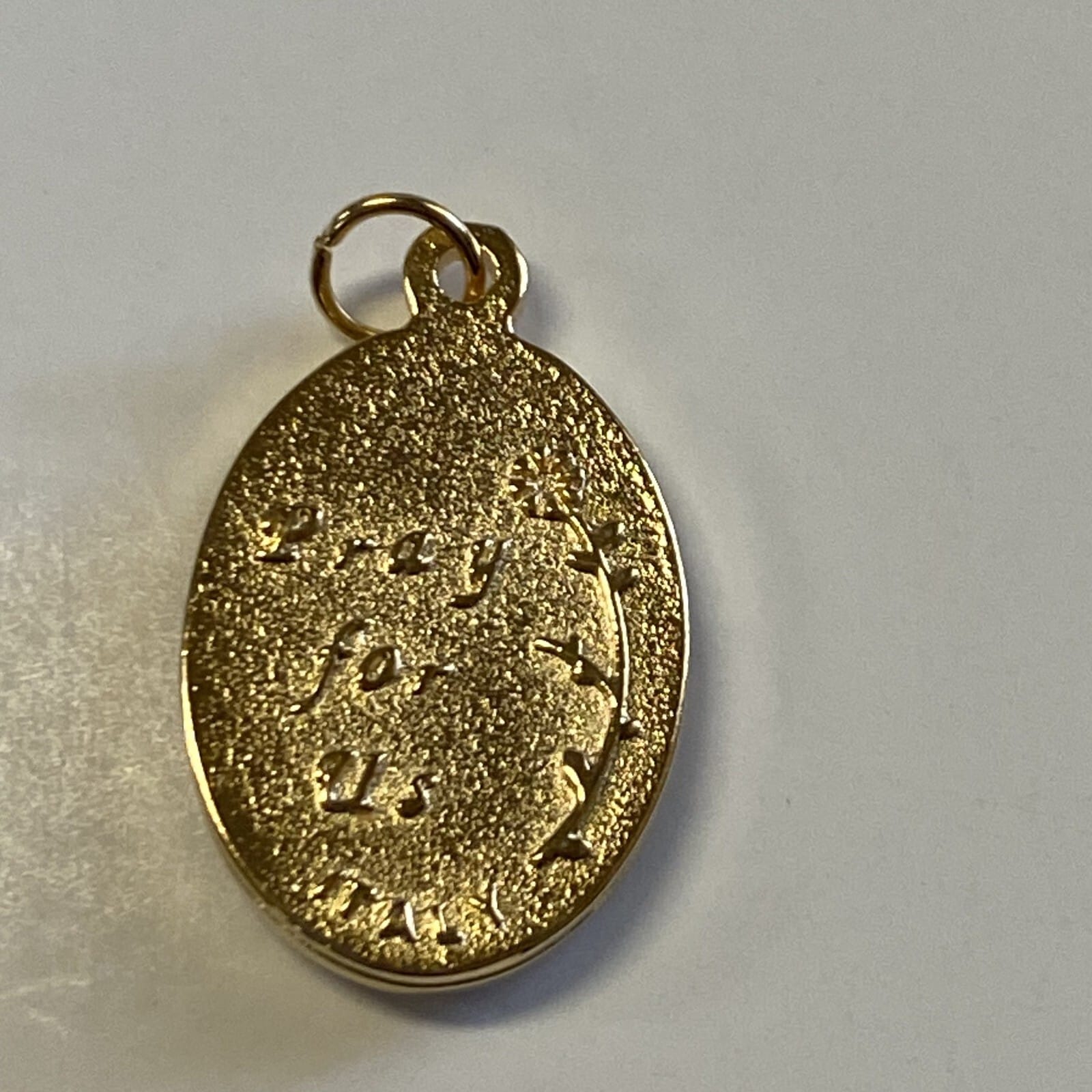 Silver and gold oval Our Lady of the Miraculous medal, Christian religious medal by Bob and Penny Lord Journeys of Faith.