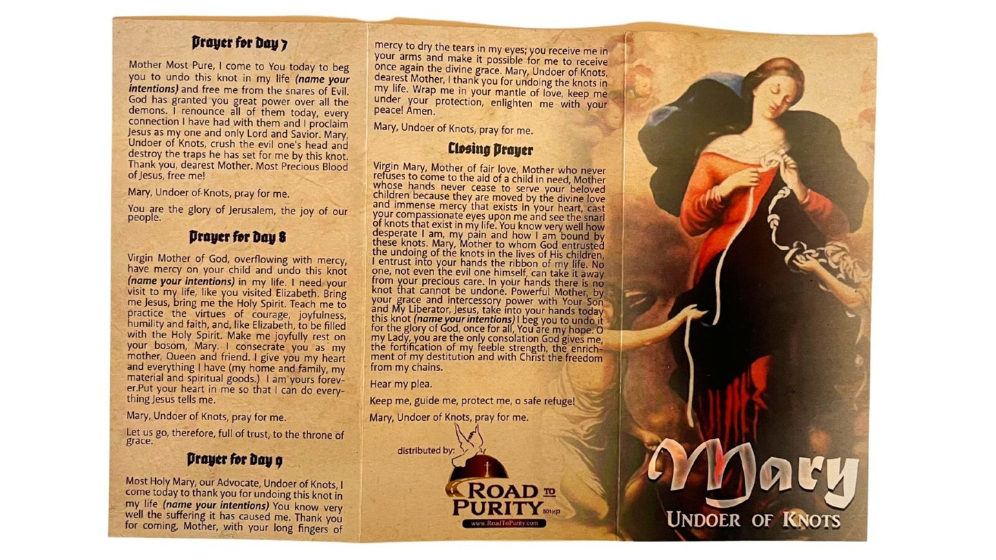 Folded Our Lady Undoer of Knots prayer card by Journeys of Faith, featuring religious imagery and Christian symbolism.