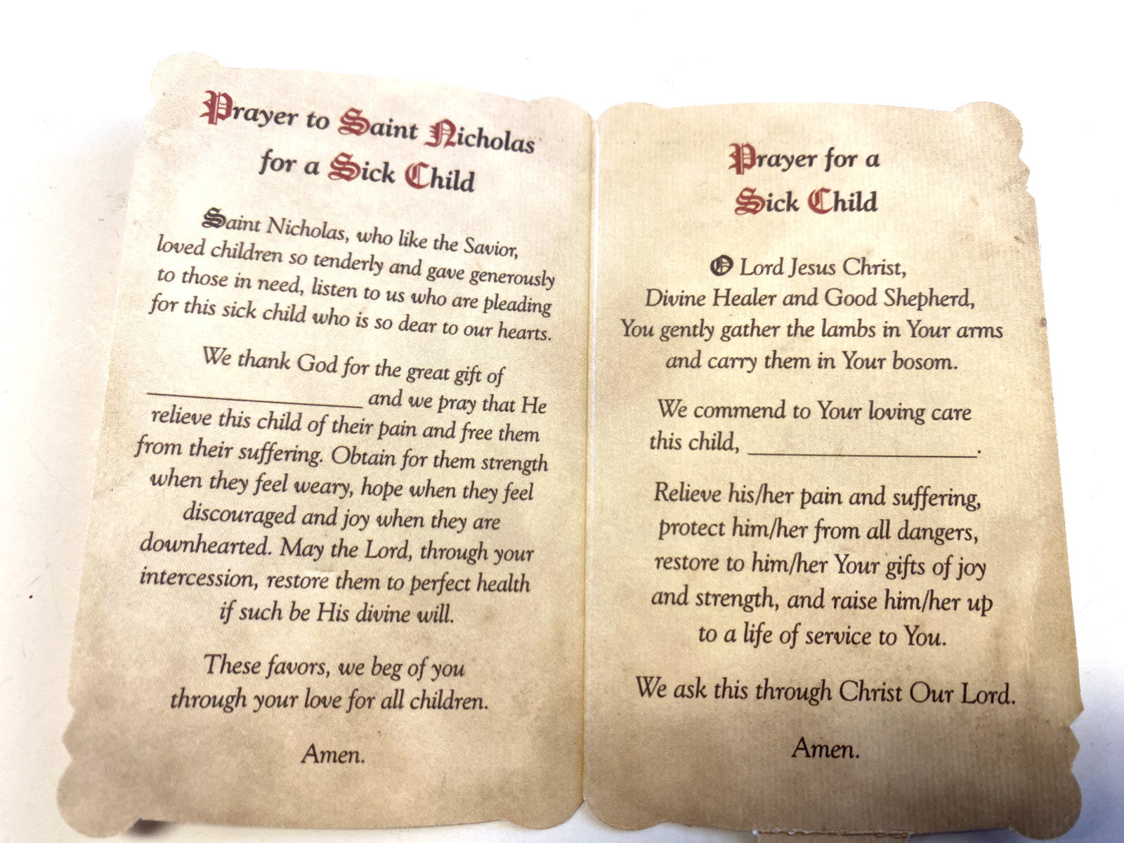 Saint Nicholas prayer folder and medal set by Bob and Penny Lord, featuring religious Christian holy card with detailed imagery.
