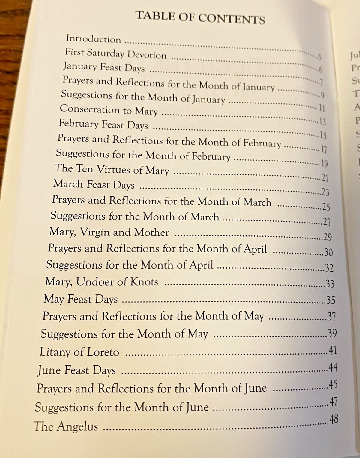 Holy card booklet titled "Though the Year with Mary" by Bob and Penny Lord Journeys of Faith, featuring religious imagery.