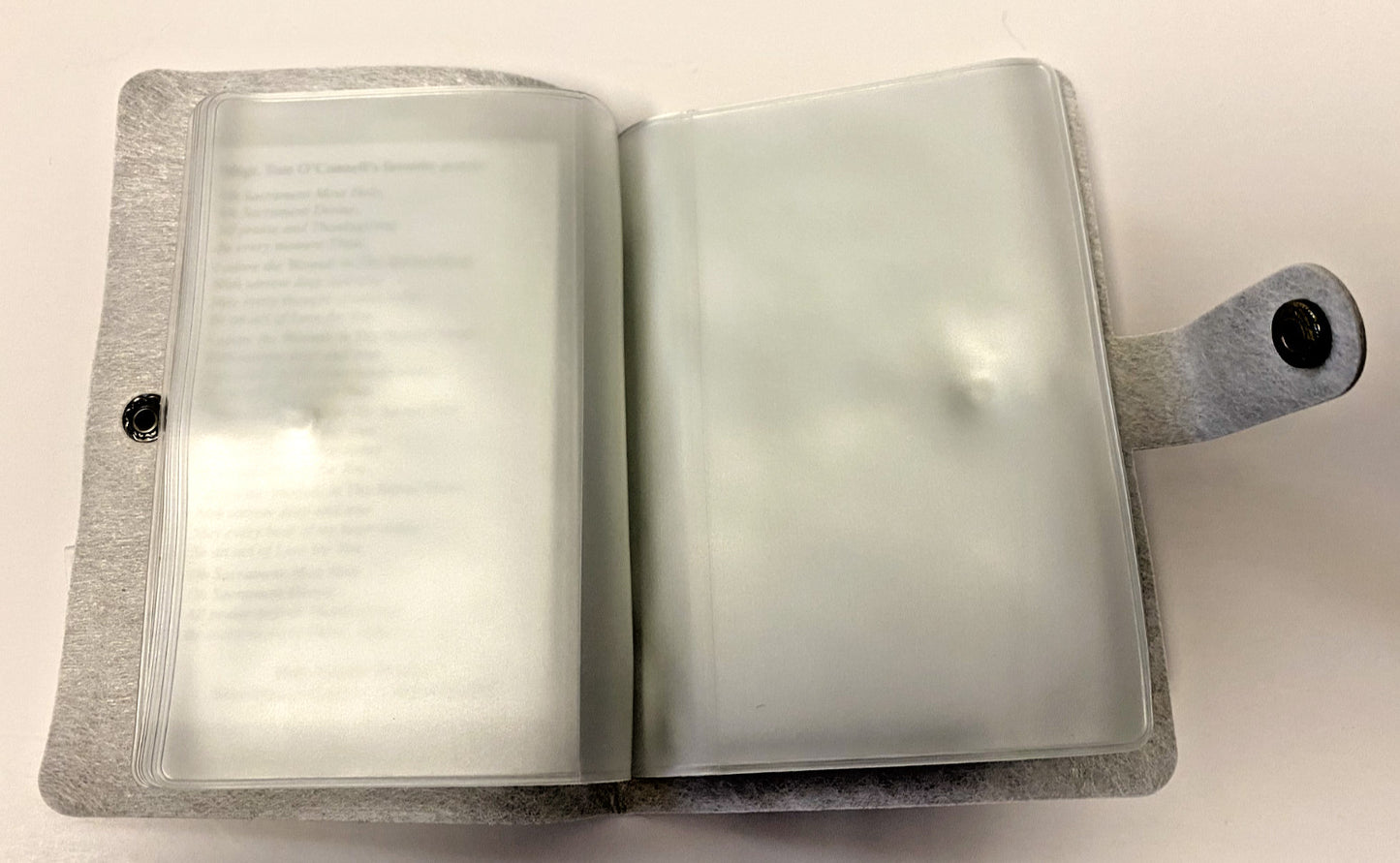 Gray Holy Card Holder booklet by Bob and Penny Lord, 5.25 inches, designed for Christian holy cards, featuring religious collectibles.
