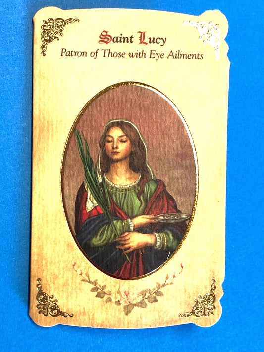 Saint Lucy novena card with medal, Christian holy card featuring image of Saint Lucy, patron of eye ailments, by Bob and Penny Lord.