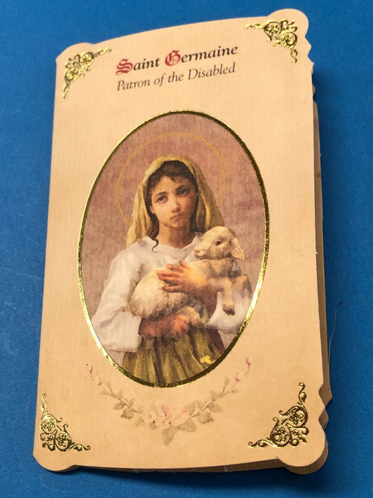 Saint Germaine de Pibrac prayer card and medal from Bob and Penny Lord, featuring religious imagery and inscriptions.