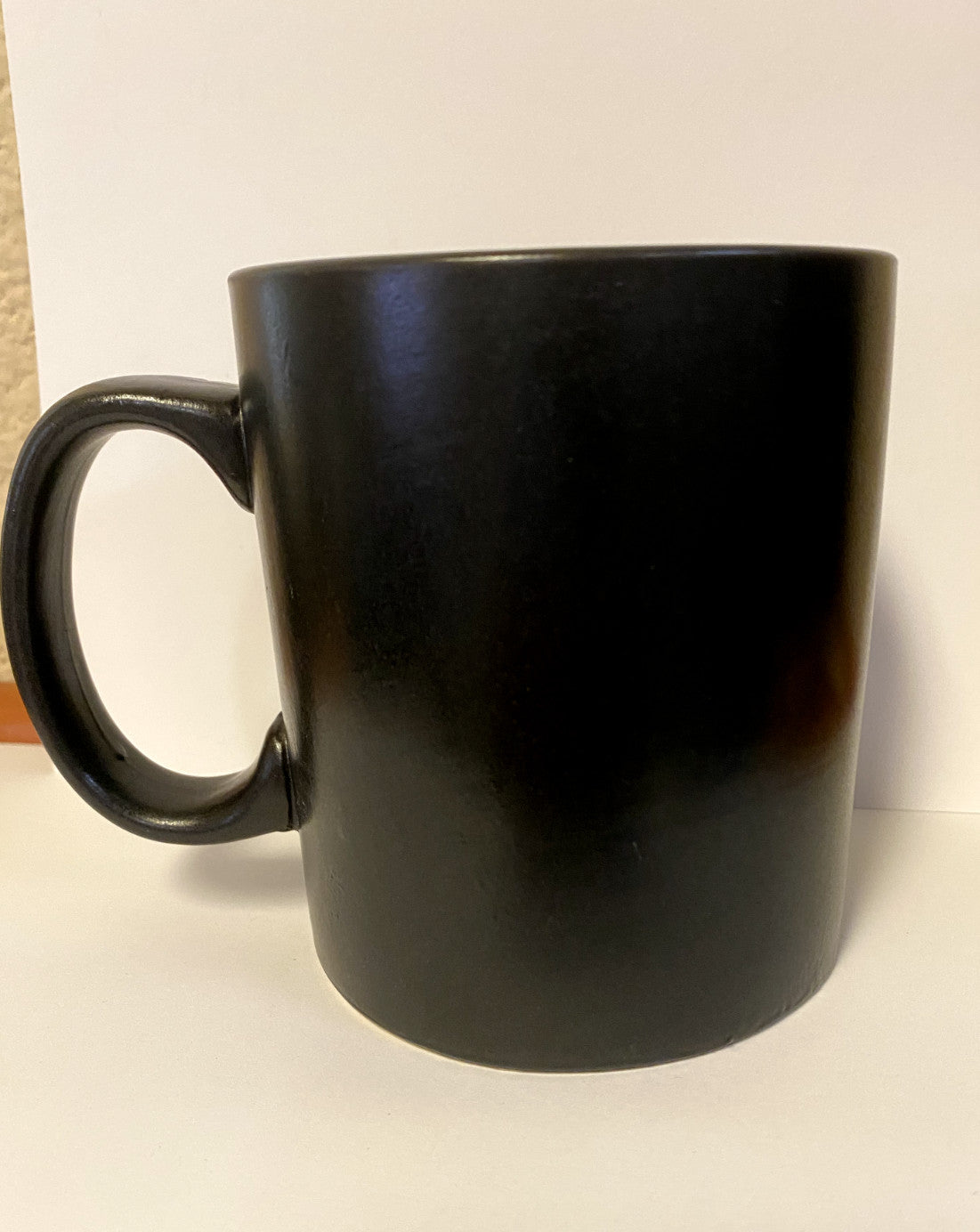 Saint Benedict 14 oz. ceramic mug featuring Christian symbols, designed by Bob and Penny Lord, perfect for religious collectibles.