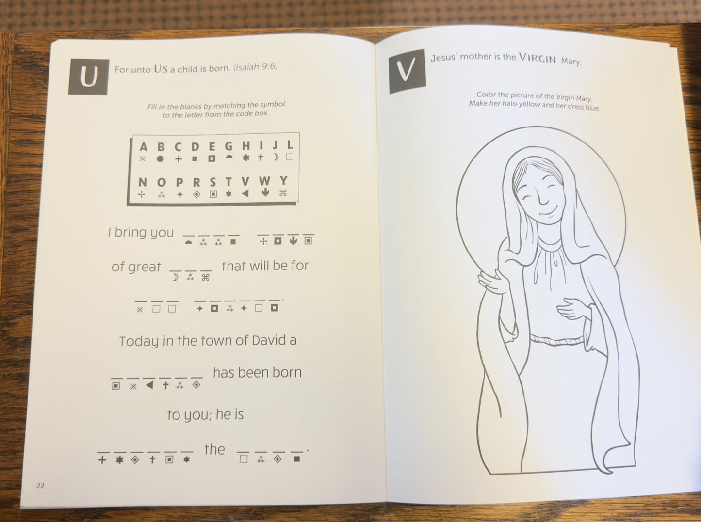Colorful Christmas A-Z activity book for children by Journeys of Faith, featuring Christian-themed puzzles and activities.