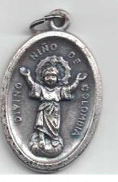 Silvertoned Divino Nino medal sculpture, detailed religious figurine for home décor, unbranded, decorative sculpture in silver finish.