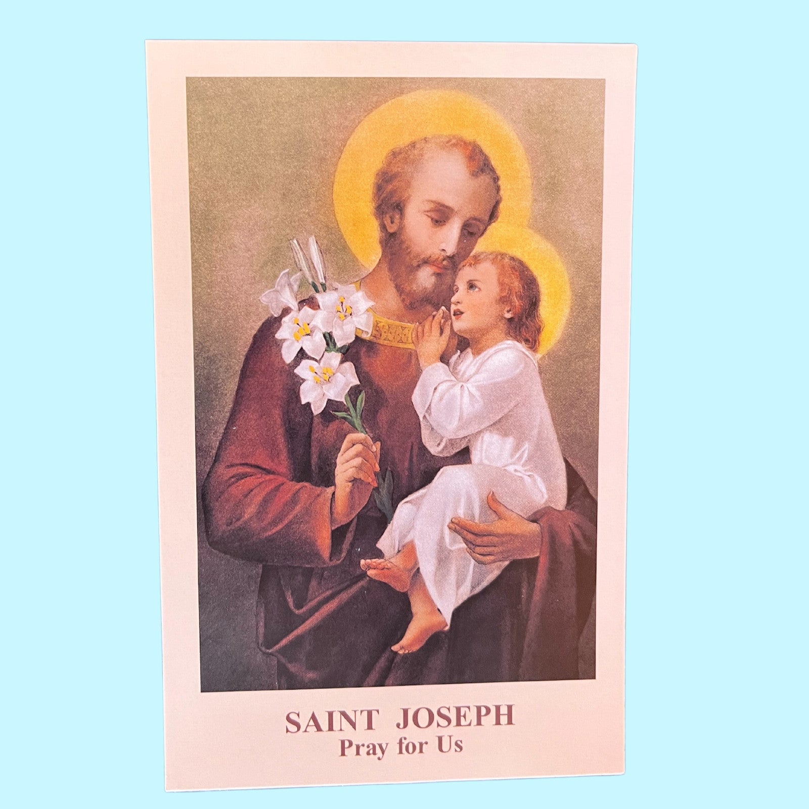 Memorare to Saint Joseph prayer card from Bob and Penny Lord, featuring religious imagery and Christian holy card design.