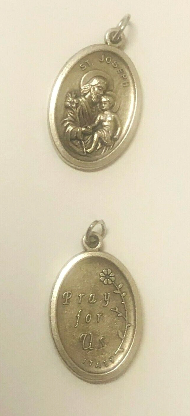 Saint Joseph with Child Jesus medal, Christian holy card from Bob and Penny Lord, featuring detailed religious imagery.