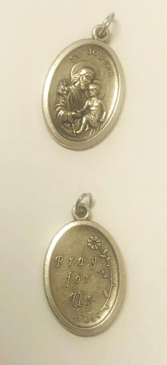 Saint Joseph with Child Jesus medal, Christian holy card from Bob and Penny Lord, featuring detailed religious imagery.