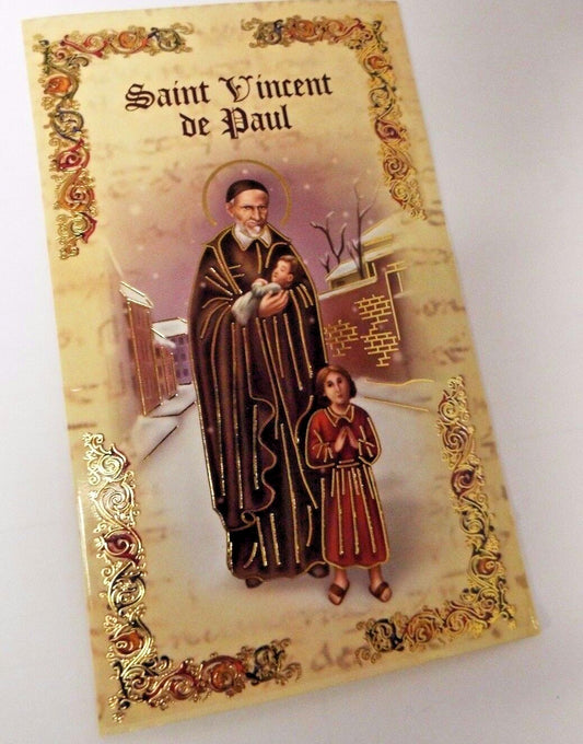 Saint Vincent de Paul biography and prayer folder with Christian holy cards, featuring religious artwork and inspirational messages.