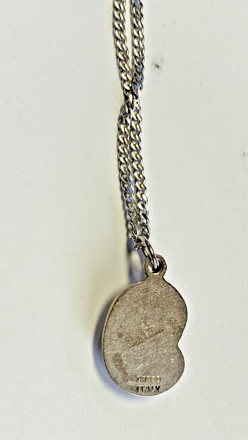 Blessed Mother with Child pendant on a 20-inch fashion jewelry necklace, detailed religious jewelry with engraved design.