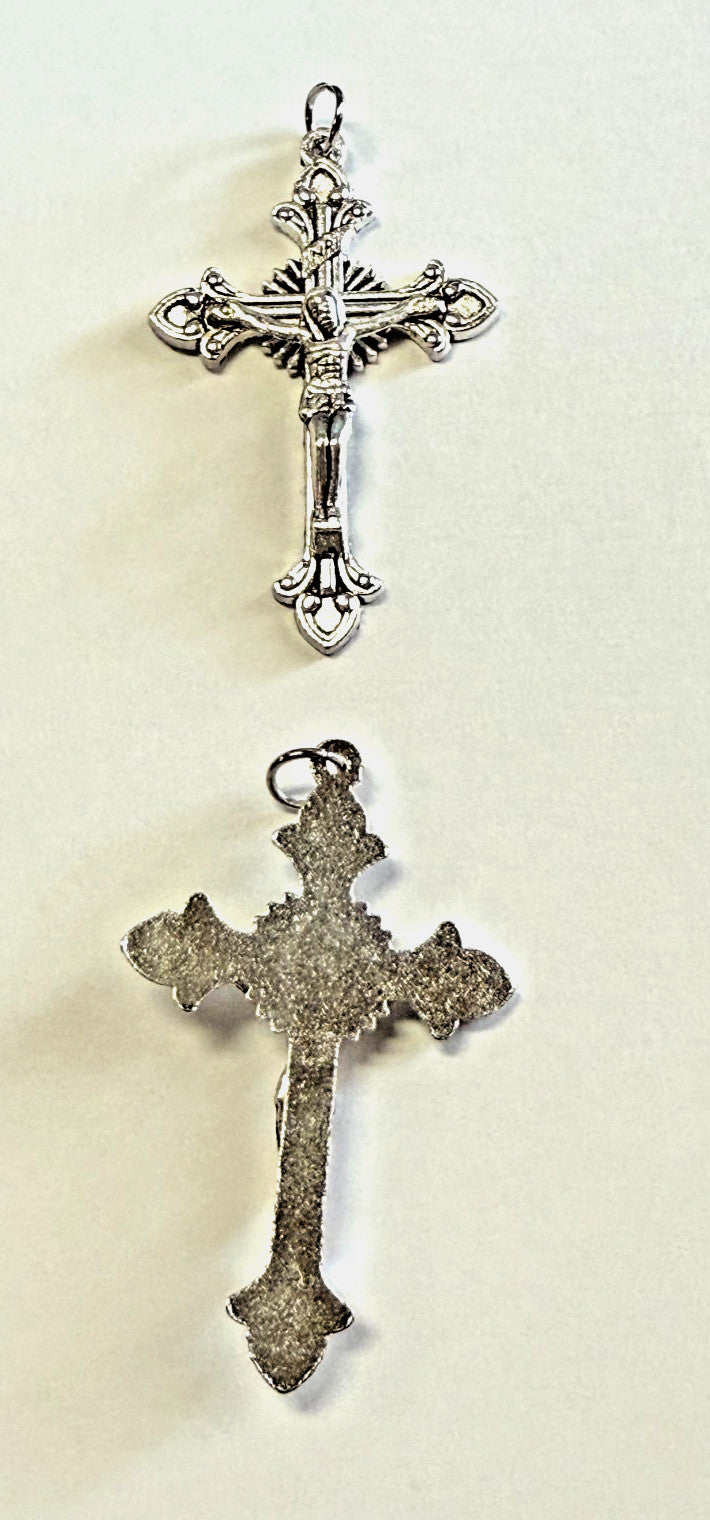 Silver plated 2-inch crucifix pendant with detailed Christian cross design, crafted by Bob and Penny Lord.