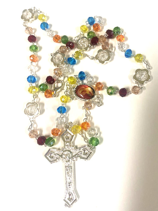 Multi-color handmade Christian rosary by Bob and Penny Lord, featuring vibrant beads, from Colombia, for religious and spiritual collection.