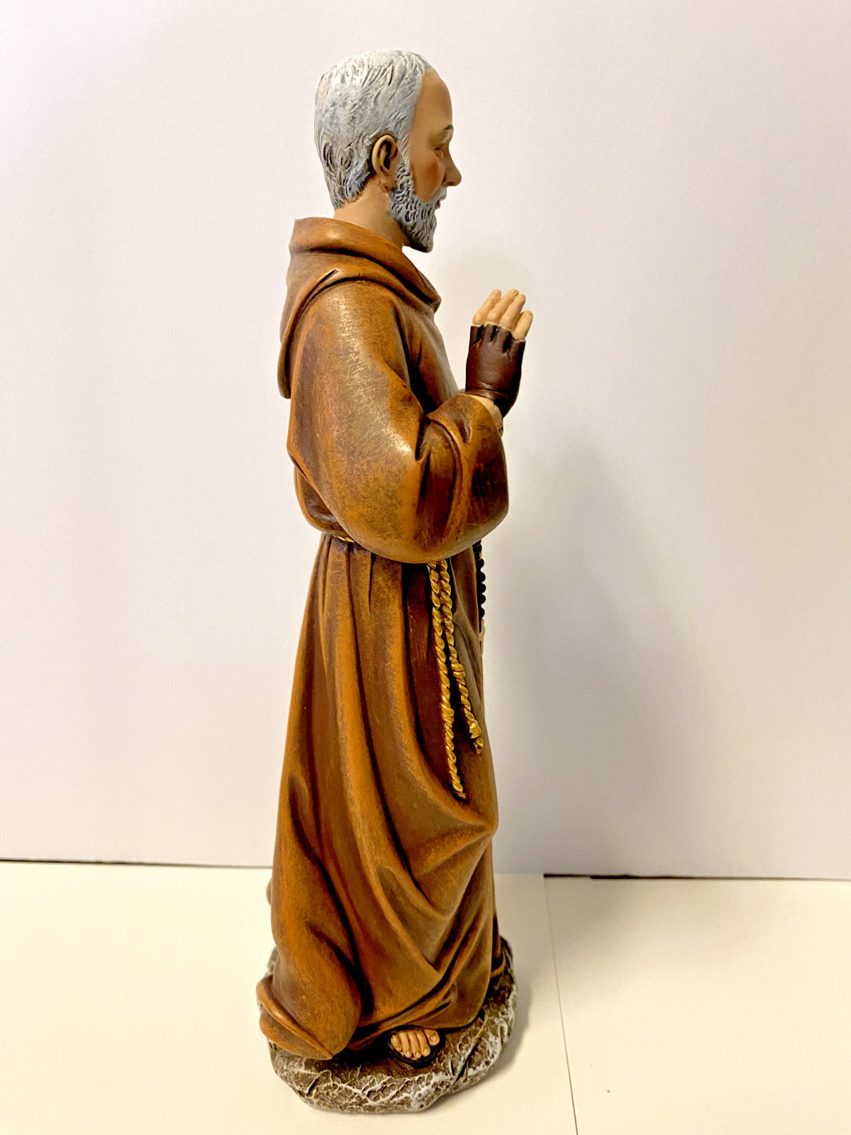 Padre Pio 10.25-inch religious statue by Bob and Penny Lord, detailed Christian collectible figure for spirituality and devotion.