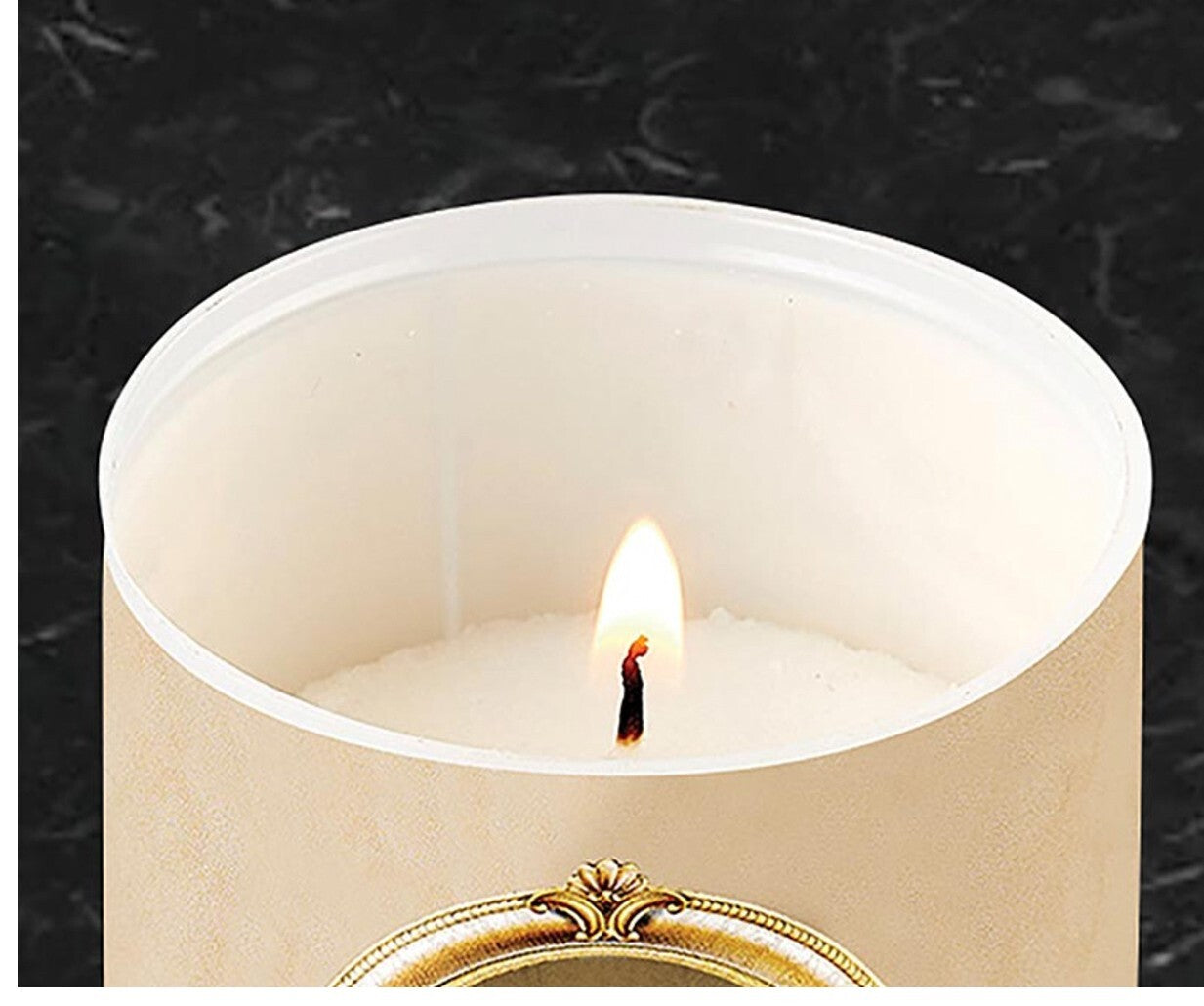 Small votive candle featuring Saint Peregrine, the Cancer Saint, with religious imagery, from Bob and Penny Lord's Christian Holy Cards collection.