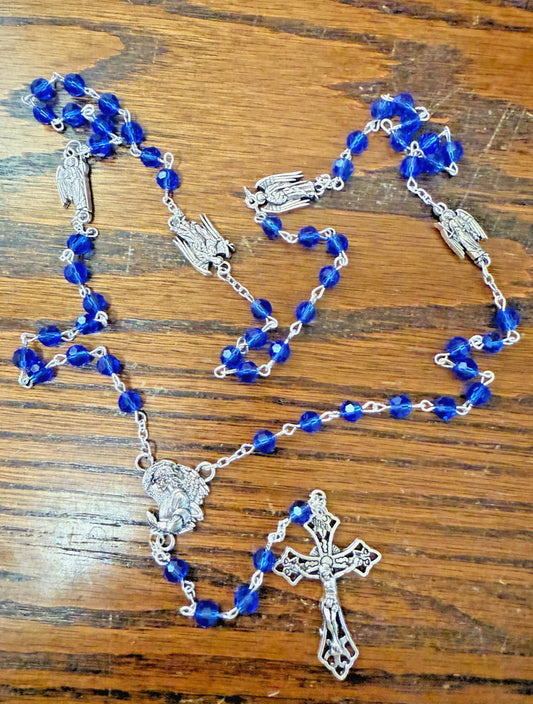 Blue glass beads rosary featuring Saint Michael and archangels, Christian religious medal by Bob and Penny Lord.