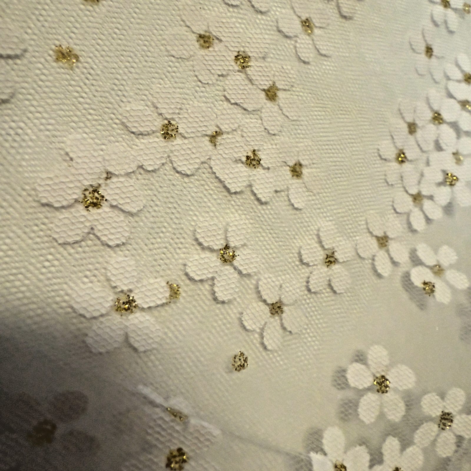 Women's white lace church veil with gold accents, elegant accessory for religious or special occasions.
