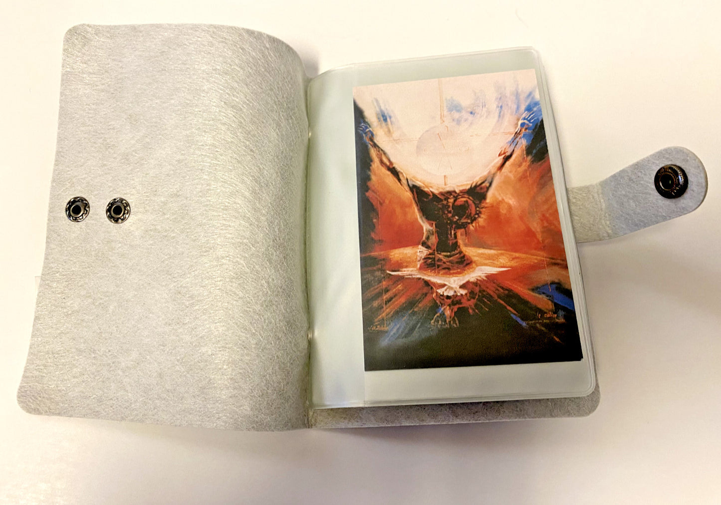 Gray 5.25-inch Holy Card Holder booklet by Bob and Penny Lord, designed for Christian holy cards and religious collectibles.