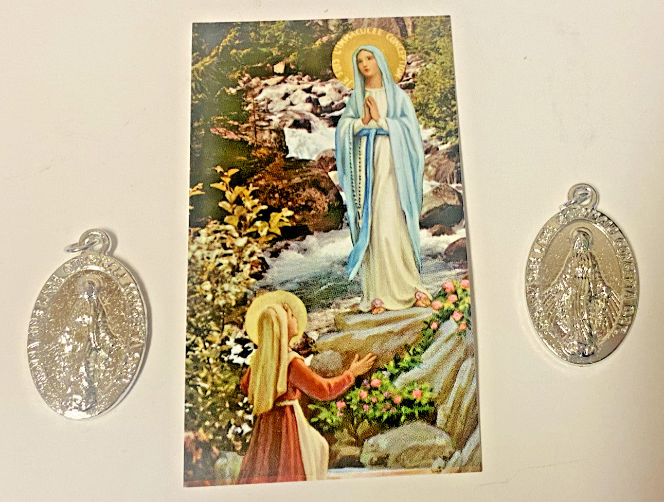 Small image card of Our Lady of Lourdes and St. Bernadette with two medals, Christian holy card by Bob and Penny Lord.