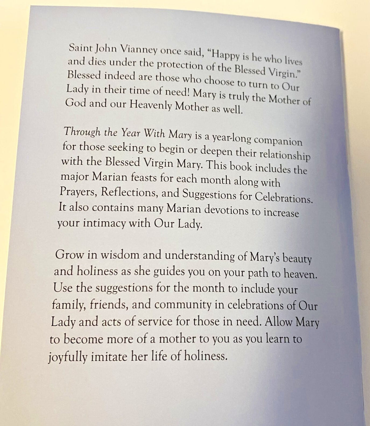 Christian holy card featuring the "Though the Year with Mary" booklet by Bob and Penny Lord Journeys of Faith, with religious imagery.