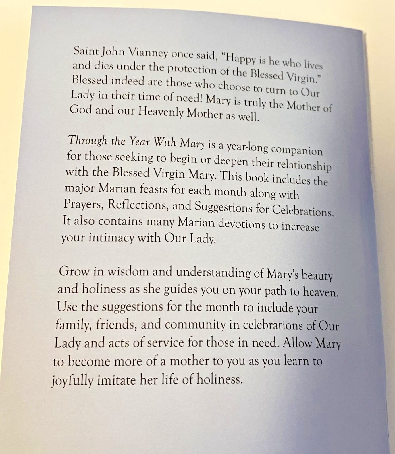 Christian holy card featuring the "Though the Year with Mary" booklet by Bob and Penny Lord Journeys of Faith, with religious imagery.