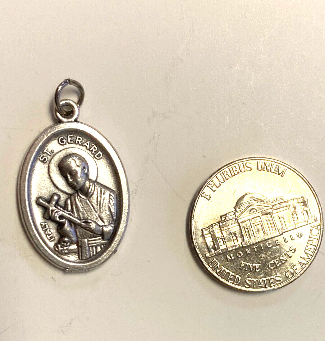 Silver tone Saint Gerard Majella and Our Lady of Perpetual Help medal with religious imagery, collectible Christianity medal by Bob and Penny Lord.