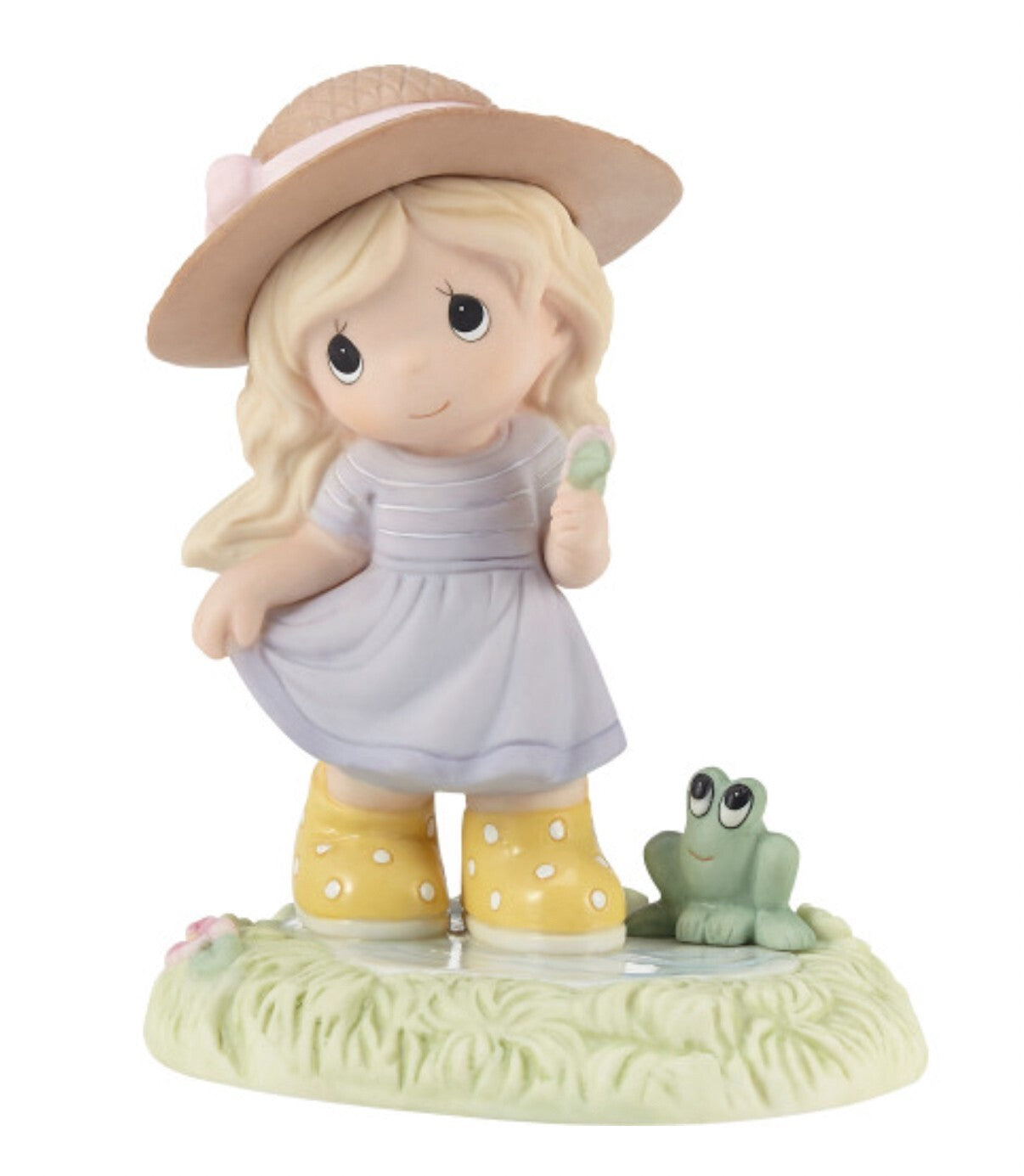 Precious Moments "You Put a Spring in My Step" decorative figurine, detailed sculpture featuring a charming character with a spring motif.