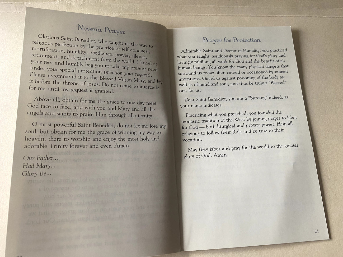 Saint Benedict Novena holy card by Bob and Penny Lord, featuring religious imagery and Christian symbolism.