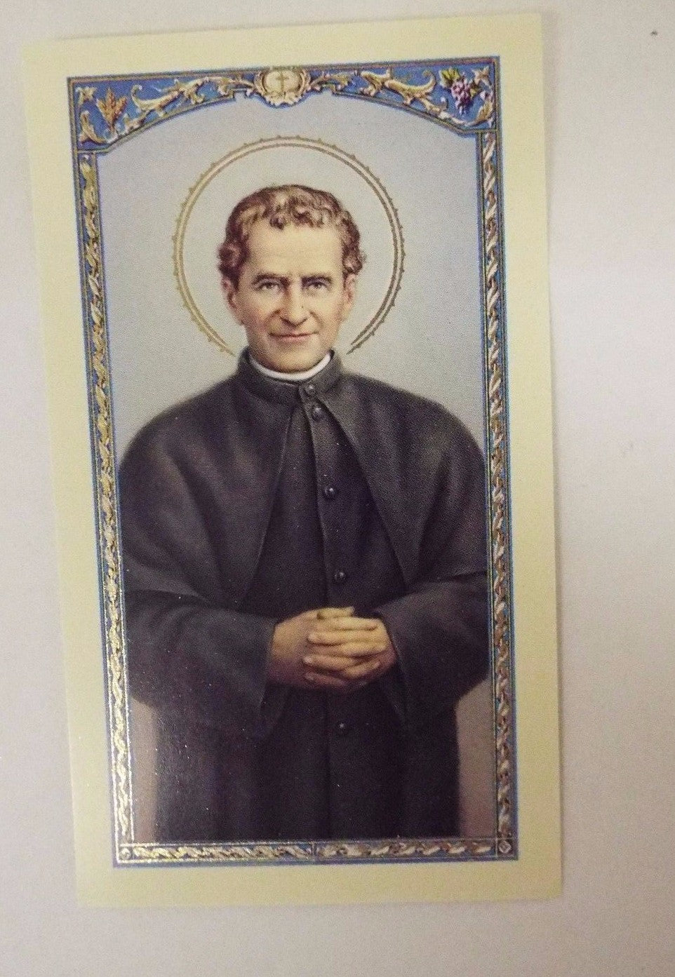 Spanish prayer card featuring Saint John Bosco, a Christian holy card from Bob and Penny Lord religious collectibles.